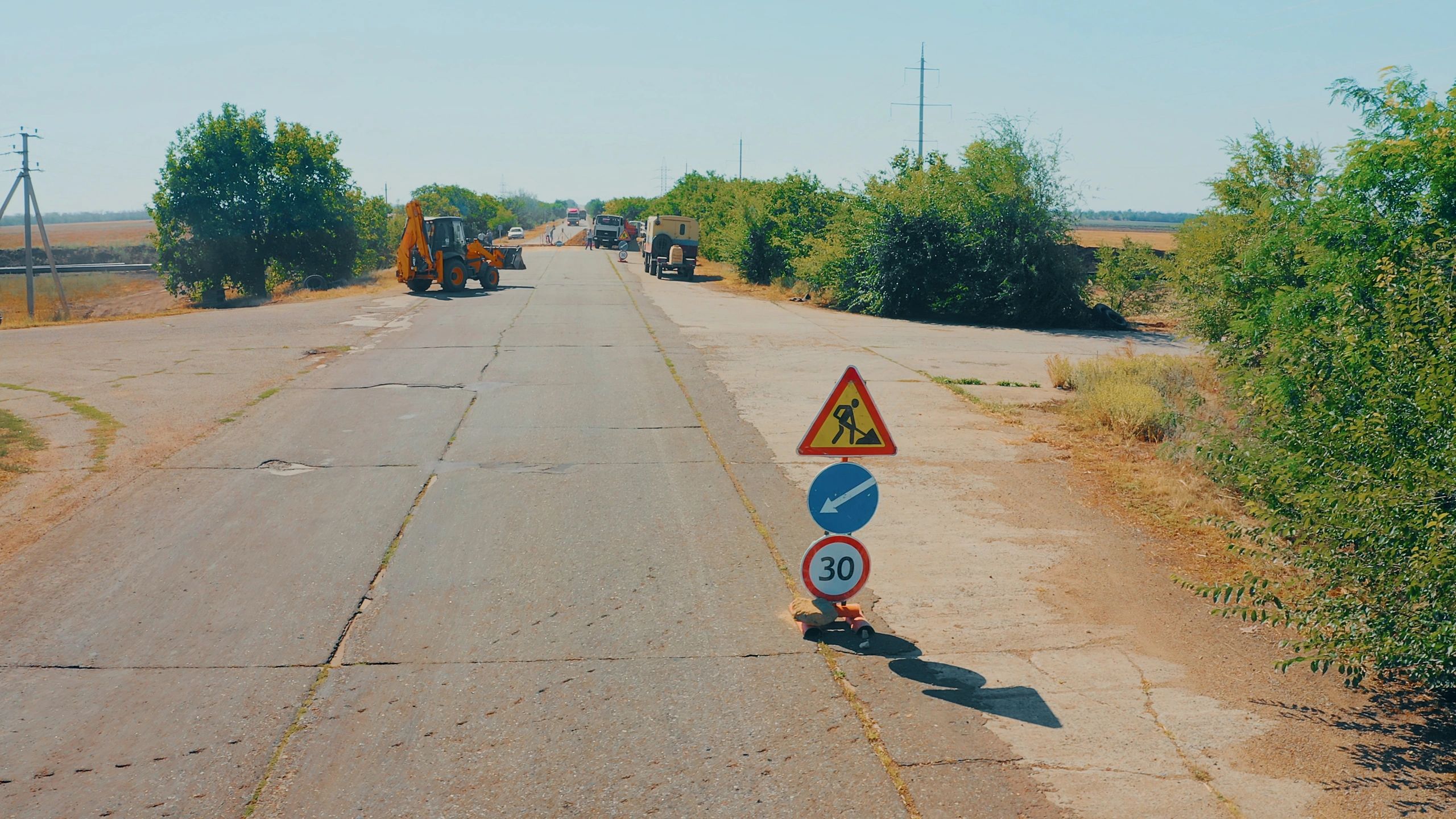 Road construction work zone with heavy equipment